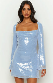 Close-up of a blue sequin mini dress featuring a square neckline and long flared sleeves