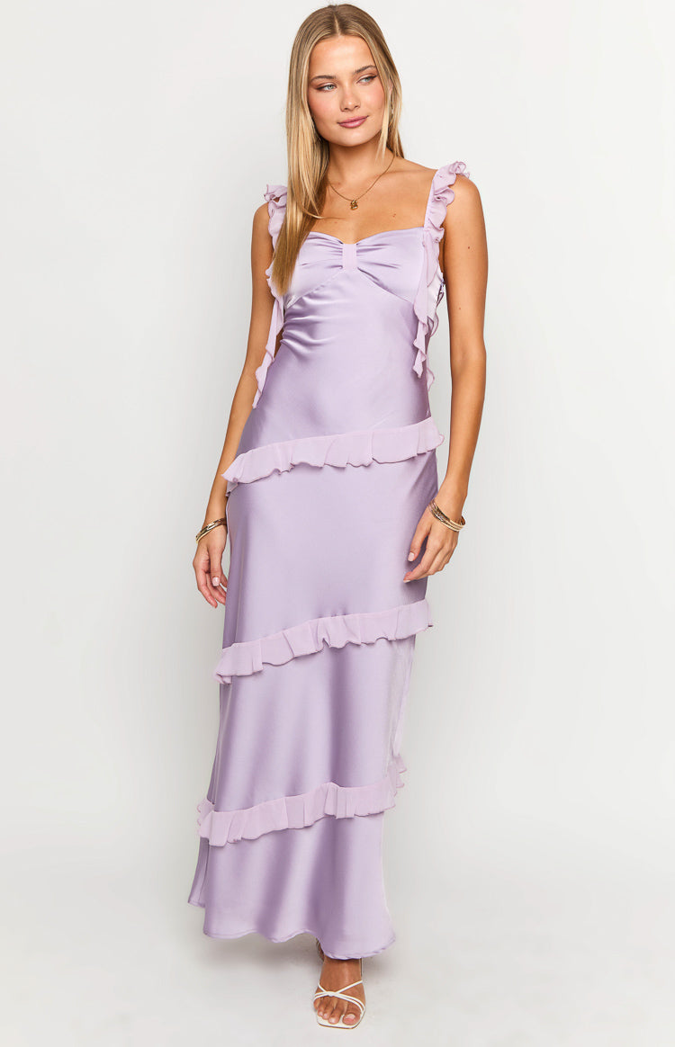 Purple satin maxi dress featuring a gathered bust, delicate ruffle straps, and tiered ruffles on the skirt