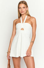 White mini dress with a halter V-neck, ruched bandeau bodice, and a small cutout detail