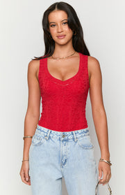 Front view of a red lace V-neck sleeveless bodysuit, highlighting the intricate floral lace pattern