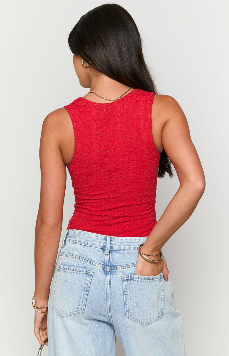 Rear view of a red sleeveless lace bodysuit with a fitted, subtly ruched back