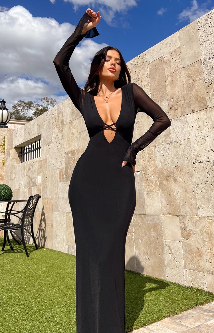 Beginning Boutique Monni Black Maxi Dress black deep V-neck bodycon maxi dress with criss-cross detail and sheer long mesh sleeves with thumbholes