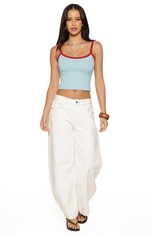 Light blue cropped tank top with red contrast trim on the scoop neckline and spaghetti straps