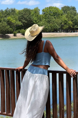 Beginning Boutique Mystic White Maxi Skirt white flowy maxi skirt with a wide blue contrast waistband