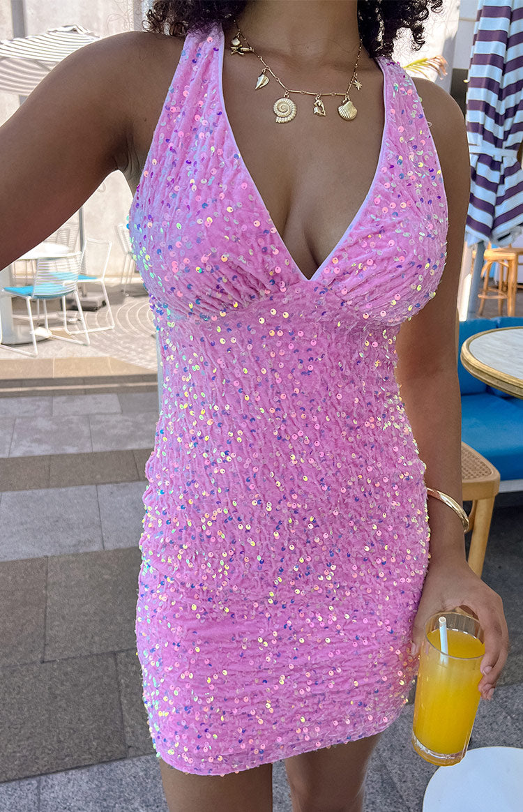 Front close-up of the pink sequin mini dress showing the deep V-neck and ruched bust