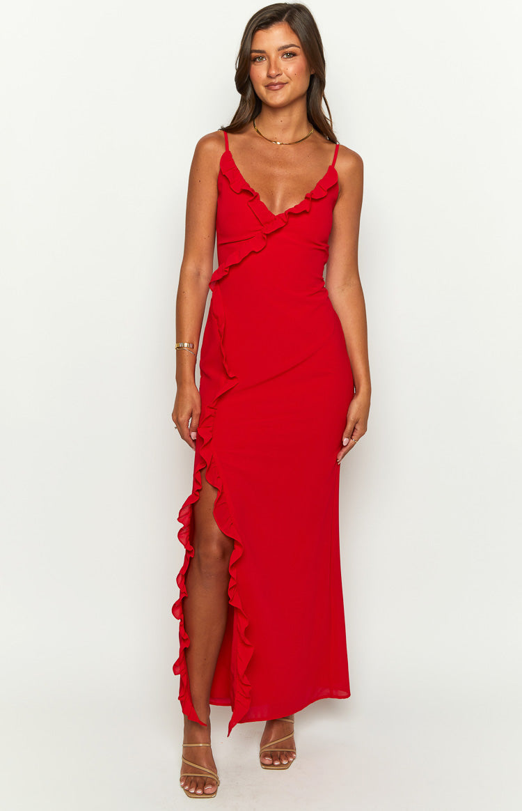 Red maxi dress with a ruffled V-neckline, fitted waist, and a high leg slit with ruffle trim
