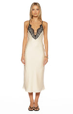 Front view of a cream satin midi dress with a deep V-neckline and black floral lace trim