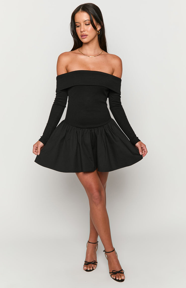 Front view of a black off-shoulder long sleeve mini dress with a ribbed knit bodice and a voluminous gathered skirt