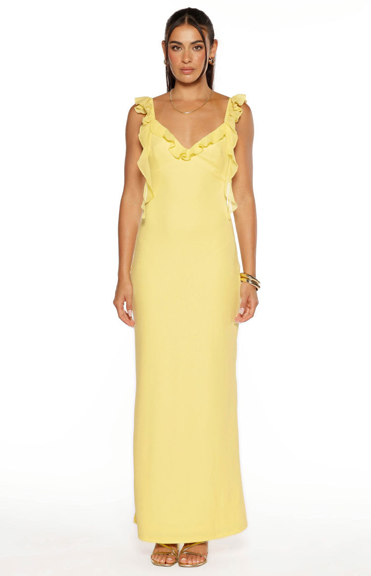 Yellow formal maxi dress with a V-neck and cascading ruffles framing the neckline and straps
