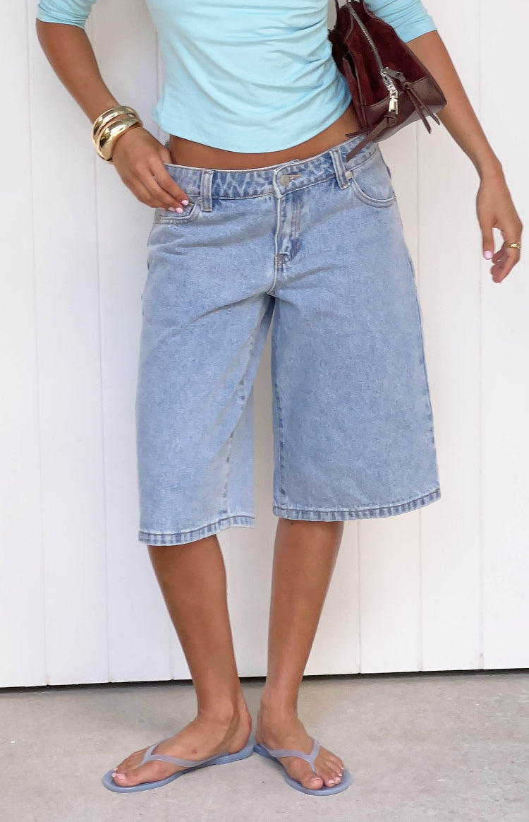 Beginning Boutique Peggy Light Wash Denim Shorts light wash denim low-rise wide-leg knee-length shorts