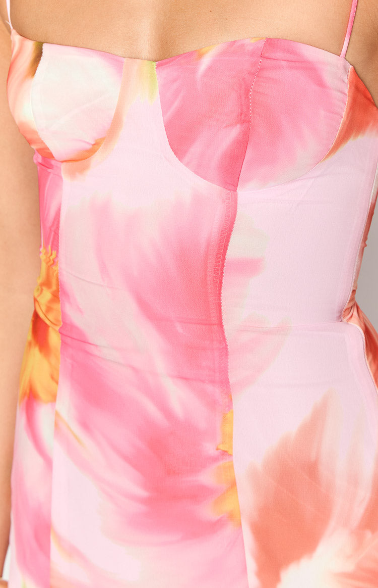 Close-up of the pink floral mini dress bodice with bustier cups and structured vertical seams
