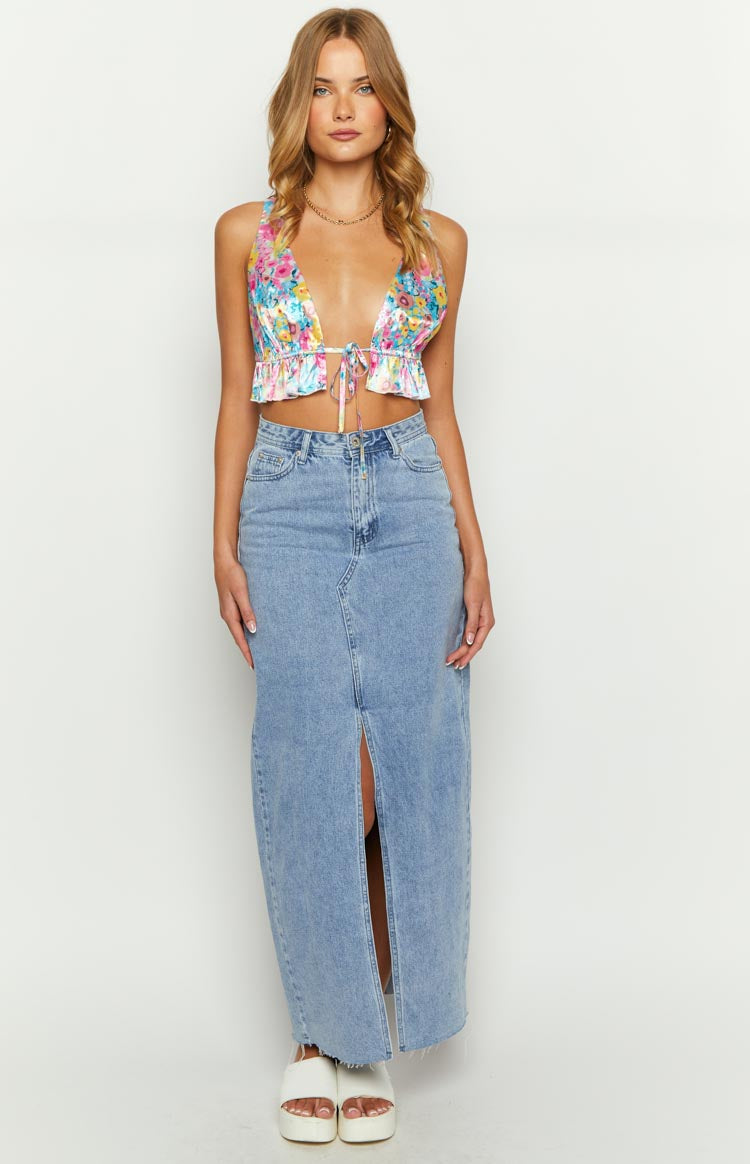 Multi-coloured floral satin crop top with a deep V-neck, tie-front detail, and ruffled hem