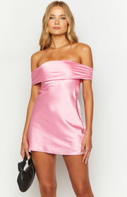 Pink satin off-the-shoulder mini dress with a draped neckline and ruched short sleeves