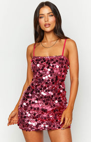 Close-up of a pink sequin mini dress with a square neckline and thin spaghetti straps