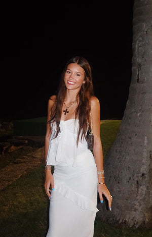 Beginning Boutique Raleigh White Ruffle Strapless Top white strapless top with tiered ruffles and a fitted bodice