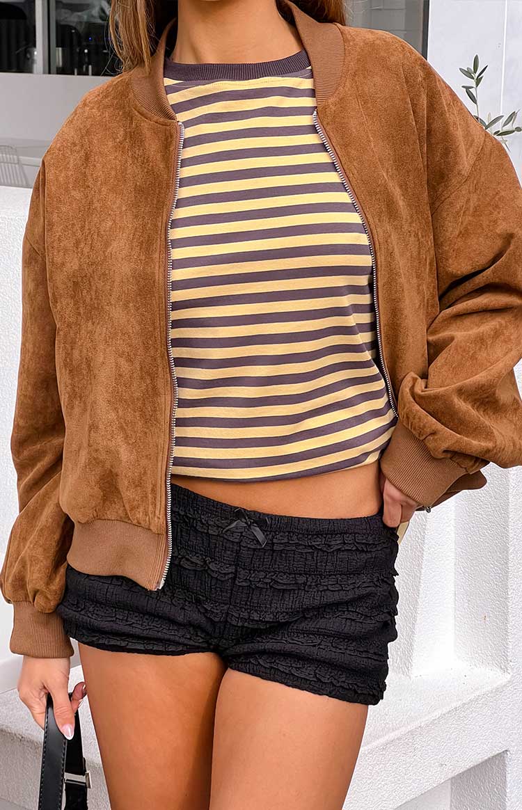 Textured brown suedette bomber jacket with ribbed collar, cuffs, and hem, and a silver front zipper