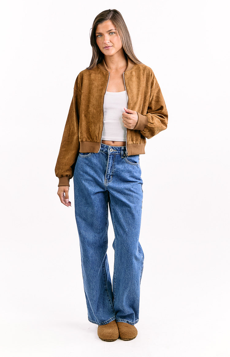 Tan suedette bomber jacket worn open, showing the soft texture and ribbed cuffs and hem