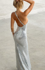 Rear view of a silver sequin maxi dress with an embellished one-shoulder strap and low scoop back