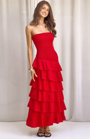 Red strapless maxi dress with a shirred bodice and tiered ruffle skirt