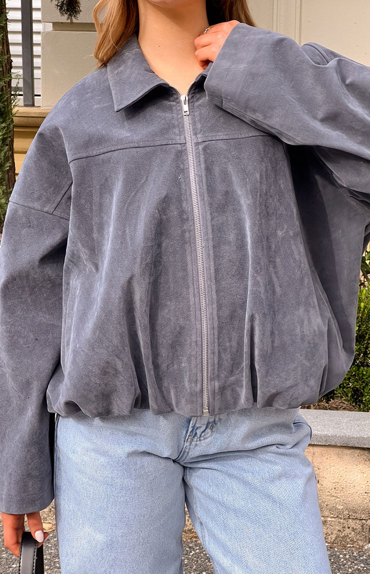 Steel grey suedette bomber jacket with a silver zip front, collared neckline, and gathered bubble hem