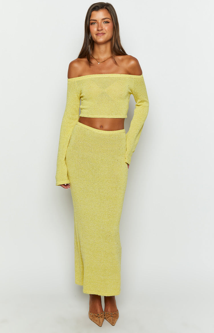 Front view of a yellow textured knit maxi skirt with a high waist and a straight, bodycon silhouette