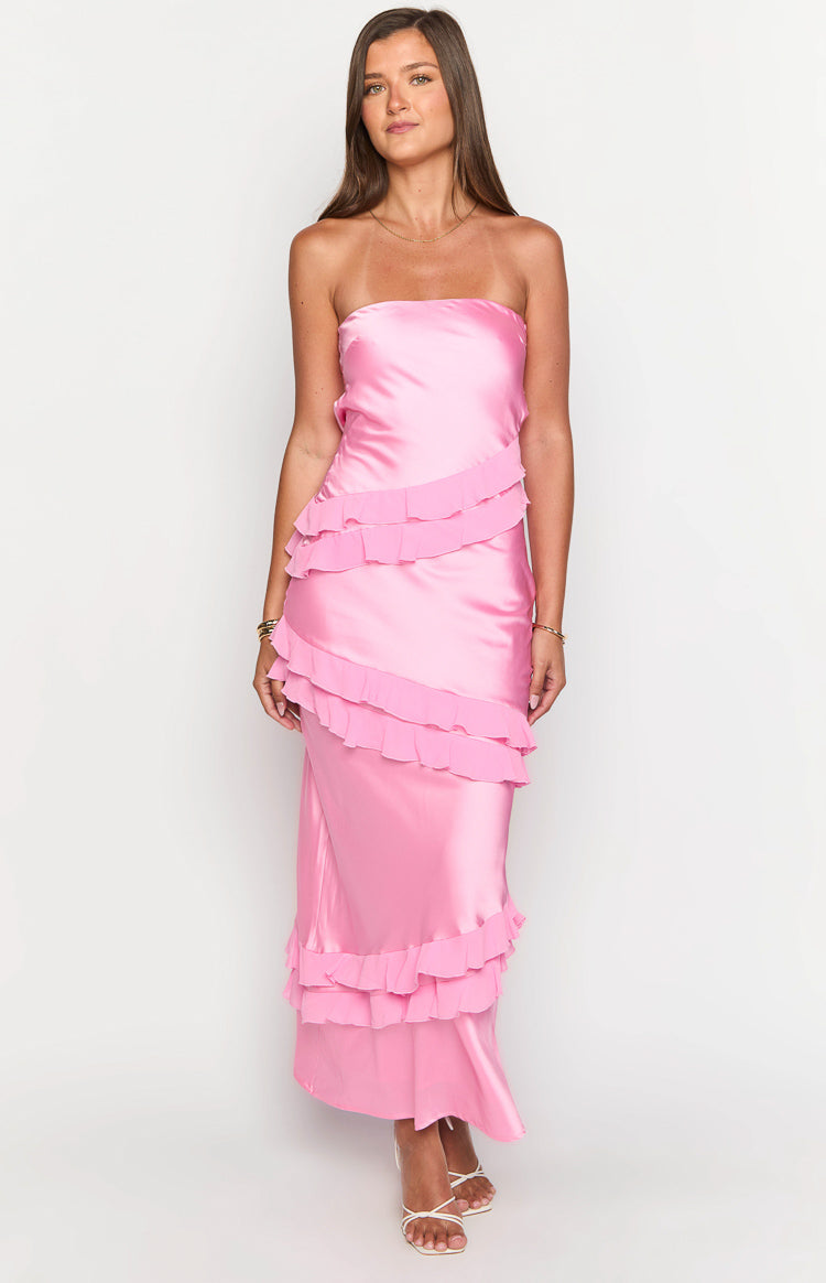 Pink strapless satin maxi dress with diagonal tiered ruffles and a long flowing skirt
