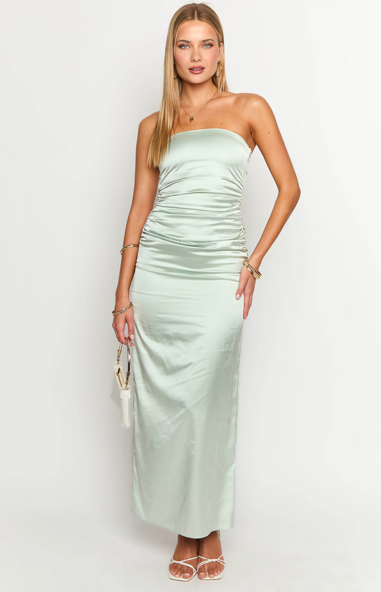 Front view of a sage green satin strapless maxi dress with a ruched bodice and a flowing skirt