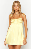 Yellow satin cup dress.