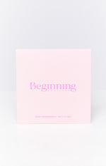 Front view of a light pink box featuring a pink script Beginning Boutique logo and SEMI-PERMANENT TATTOO SET text