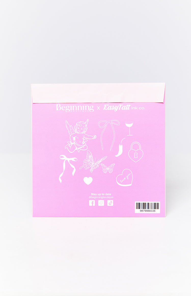 Pink envelope with white line art illustrations of a cherub, bows, butterflies, heart with 'love you', padlock, chili, and cocktail glass