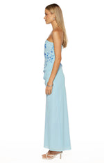 Side view of a light blue strapless maxi dress with blue floral beading on the bodice and a draped waist