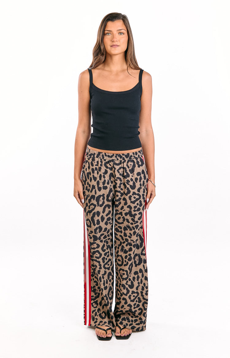 Relaxed fit leopard print wide-leg pants with an elasticated waist and red and white side stripes