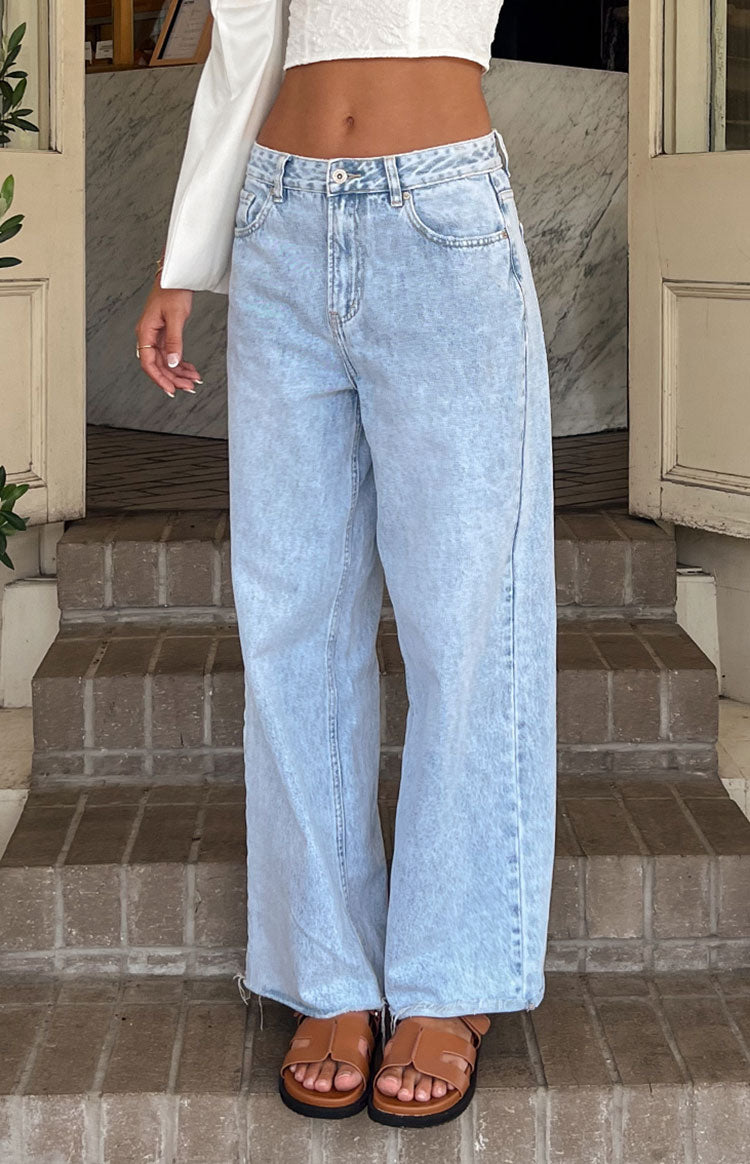 Beginning Boutique She's Yours Light Wash Denim Wide Leg Boyfriend Jeans light wash wide leg relaxed fit jeans with distressed hem