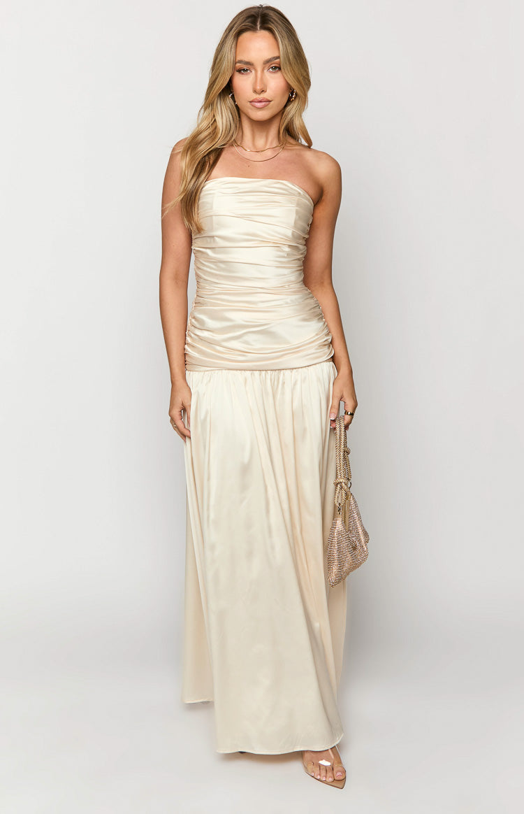 Cream satin strapless maxi dress with a ruched bodice and a flowing skirt
