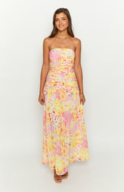 Vibrant yellow floral print strapless maxi dress with a ruched bandeau bodice and a flowing skirt