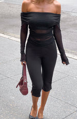 Black mesh off shoulder top with long sheer sleeves and ruched body details