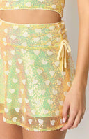 Beginning Boutique Stay Yellow Sequin Mini Skirt yellow sequin heart print flared mini skirt with side tie detail