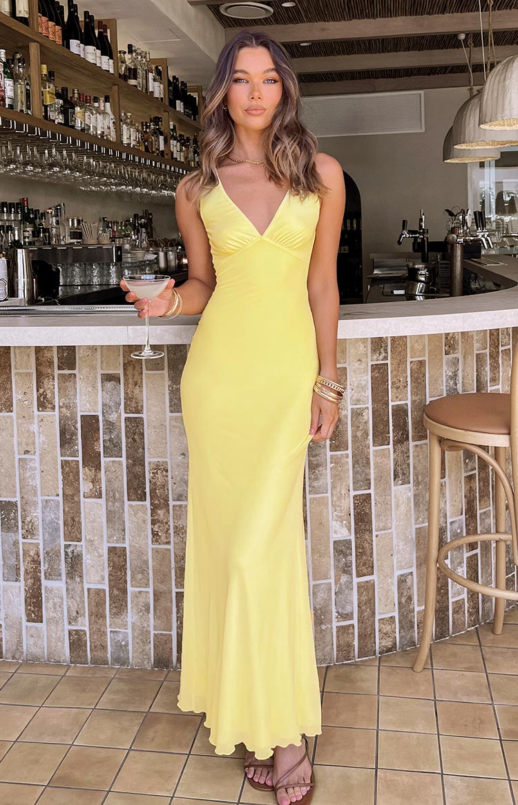 Beginning Boutique Sunflower Yellow Mesh Maxi Dress sunflower yellow mesh V-neck maxi dress with spaghetti straps and ruched bust