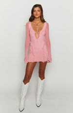 Pink mesh long sleeve mini dress with a V-neck, tie-front cutout, and ruffle details