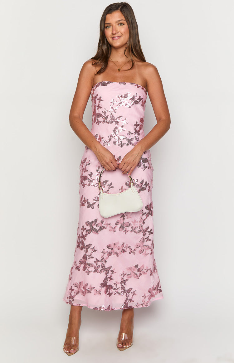 Front view of a pink strapless maxi dress with shimmering butterfly sequin embellishments