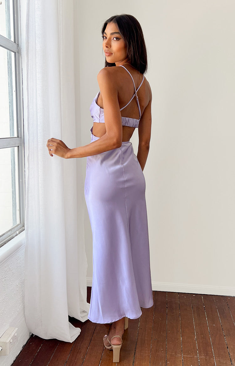 Rear view of a lilac satin maxi dress with criss-cross spaghetti straps and side cutouts