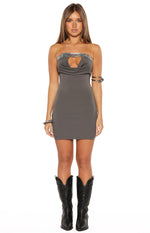 Fitted grey strapless mini dress with a cowl neckline, front cutout, and silver sequin trim