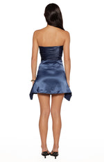 Rear view of a navy strapless satin mini dress with a ruched bodice back and asymmetric hem