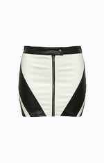 White and black PU mini skirt with a front zipper closure and bold angular contrast panels