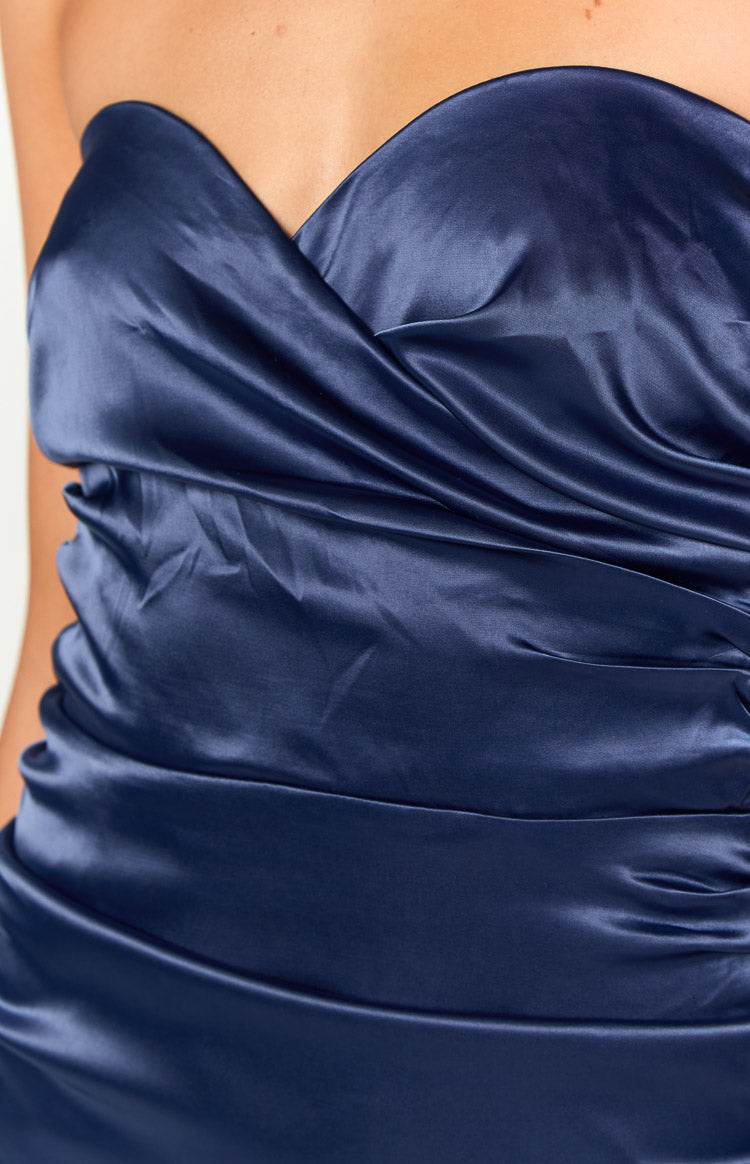 Close-up of the navy satin strapless mini dress showing the twisted sweetheart neckline and ruched bodice detail