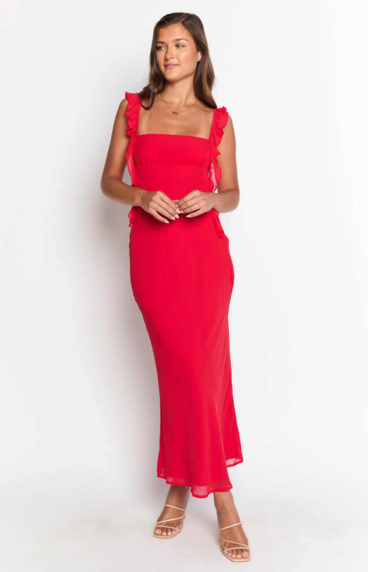 Red maxi dress with a square neckline, ruffled shoulder straps, and a flowing skirt