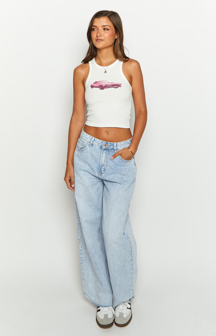 White ribbed knit tank top with a high neckline and a pink car graphic on the front, cropped at the waist