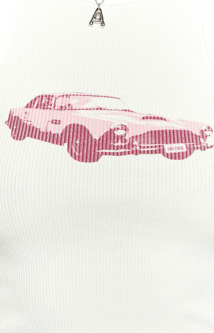 Close-up of the pink and maroon car graphic on the front of a white ribbed tank top
