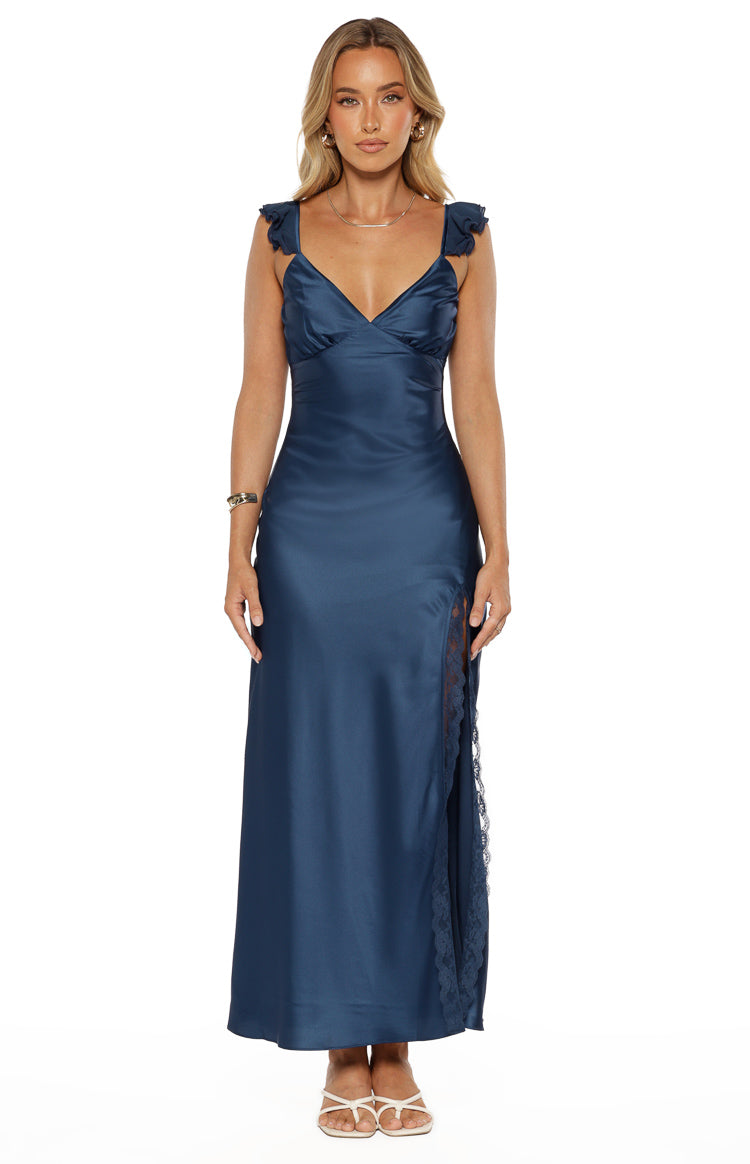 Navy satin maxi dress with a V-neckline, ruffled shoulder straps, and a high leg split with lace trim