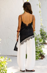 Ziva Black Satin Lace Trim Asymmetrical Top Image